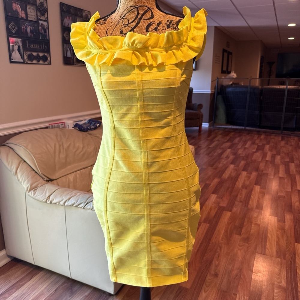 NWT…Fashion Nova size XL (runs small) yellow bodycon with ruffle detail dress